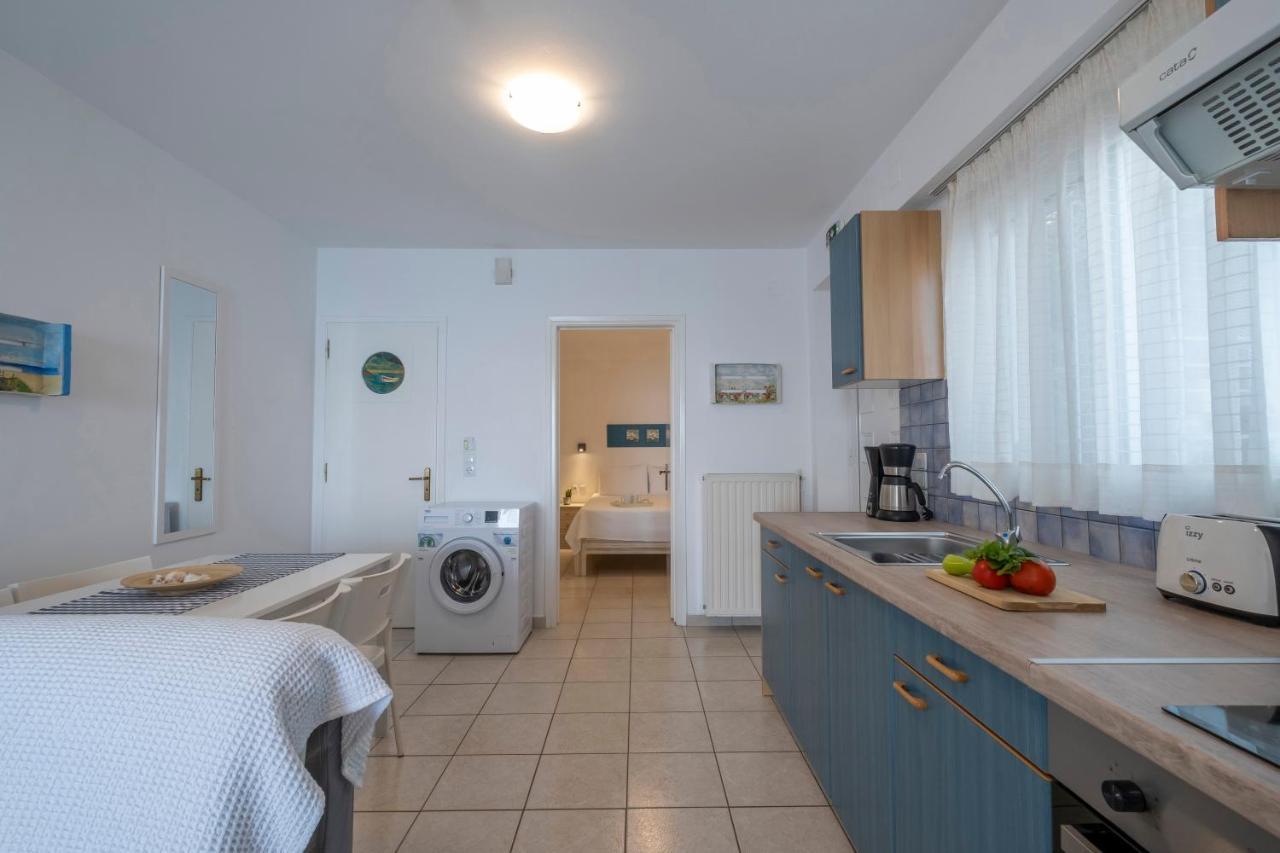 Meli Apartments & Villas Kiveri Luaran gambar